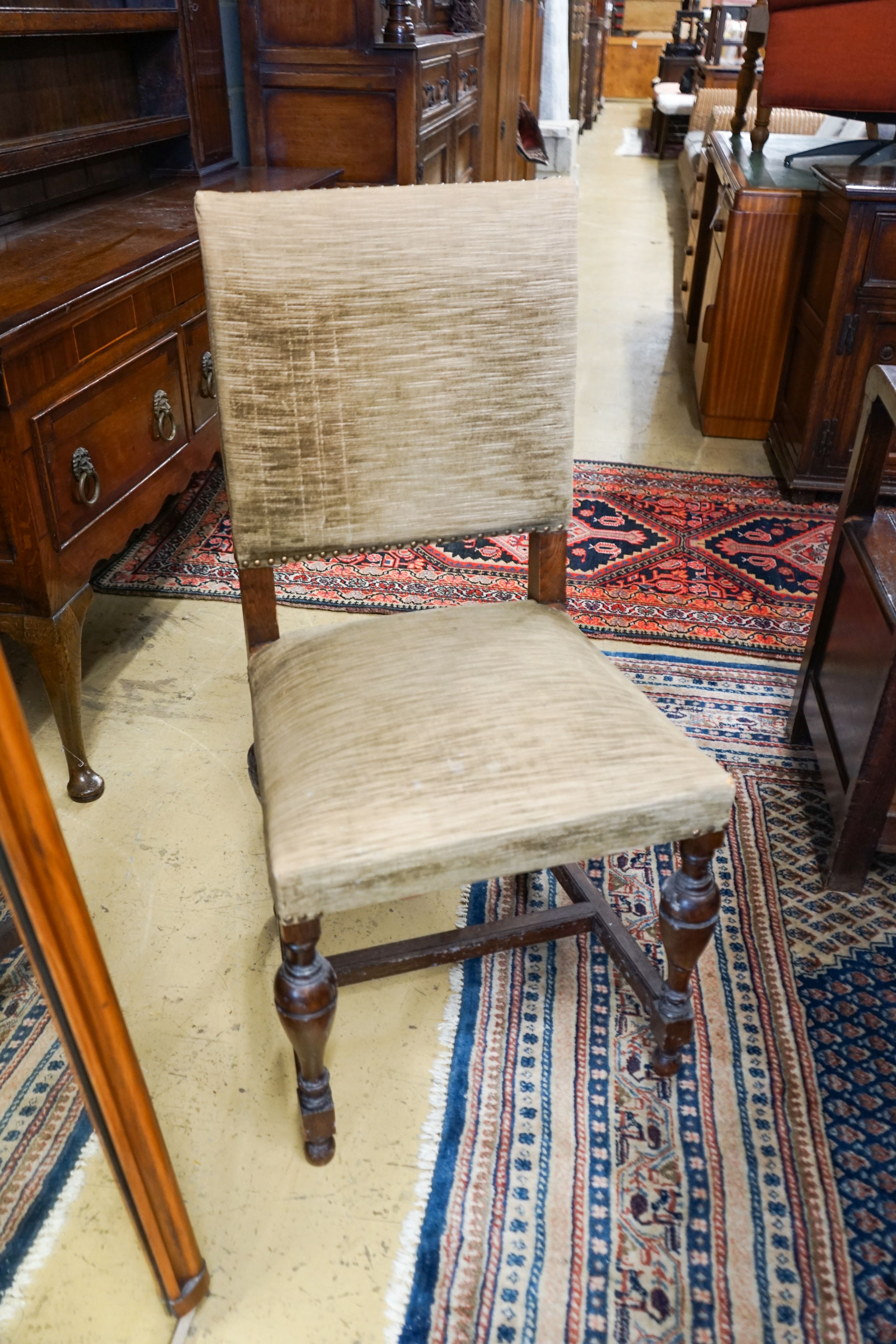 A 19th century Dutch rectangular oak extending dining table, 220cm extended, width 94cm, height 76cm on four carved bulbous supports (two additional leaves) and a set of five dining chairs